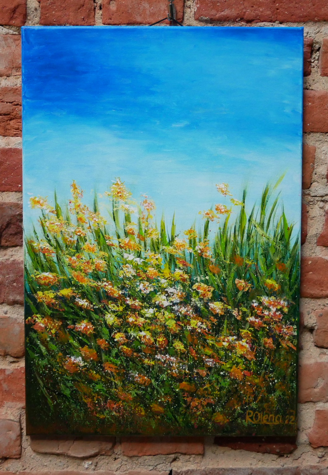 Obraz Oleny Radczenko przedstawiający kwietną łąkę